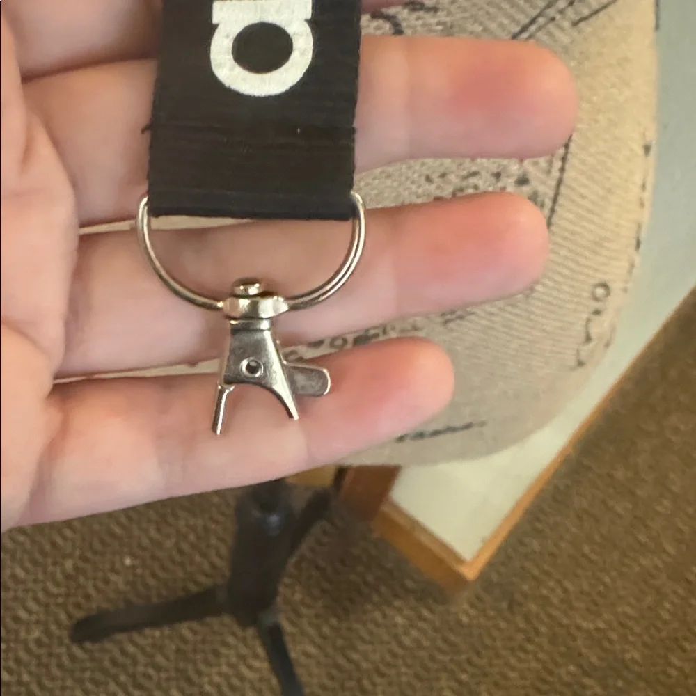 Barely used authentic ADIDAS lanyard with pinch clip off section on bottom.